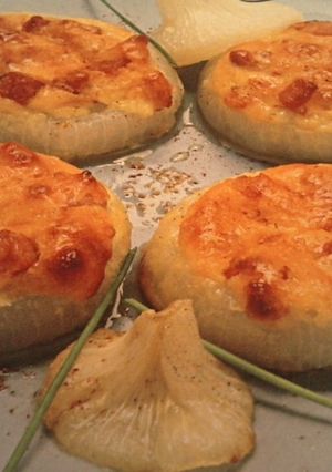 Una foto de Cebollas rellenas de crema de queso