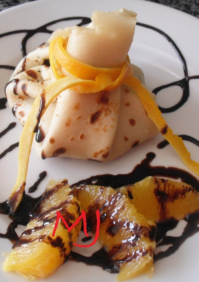Una foto de Crêpes de naranja