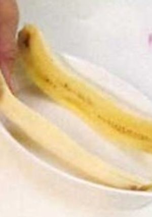 Una foto de Banana split con helado de vainilla
