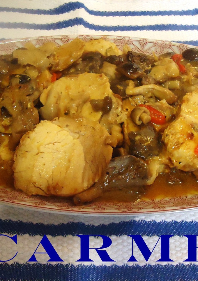 Una foto de Lomo de cerdo trufado con setas variadas