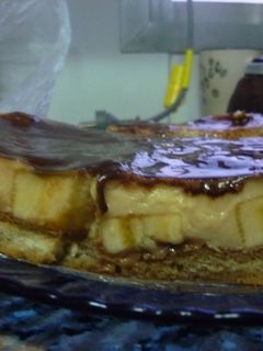 Una foto de Postre de bananas con crema americana