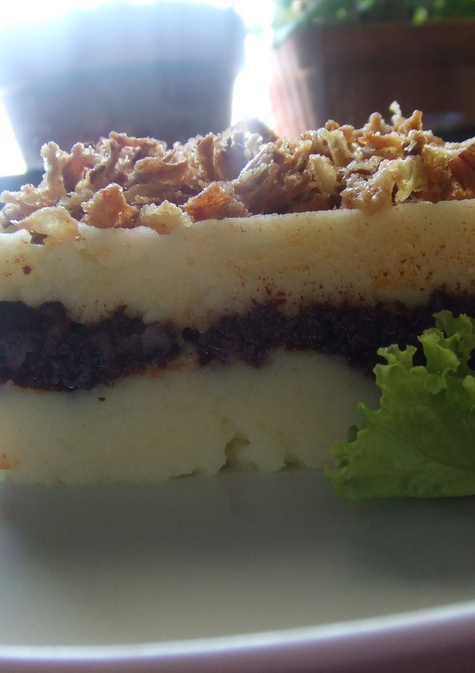 Una foto de Pastel de morcilla y nueces