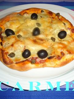 Una foto de Pizzeta de jamón serrano y champiñones