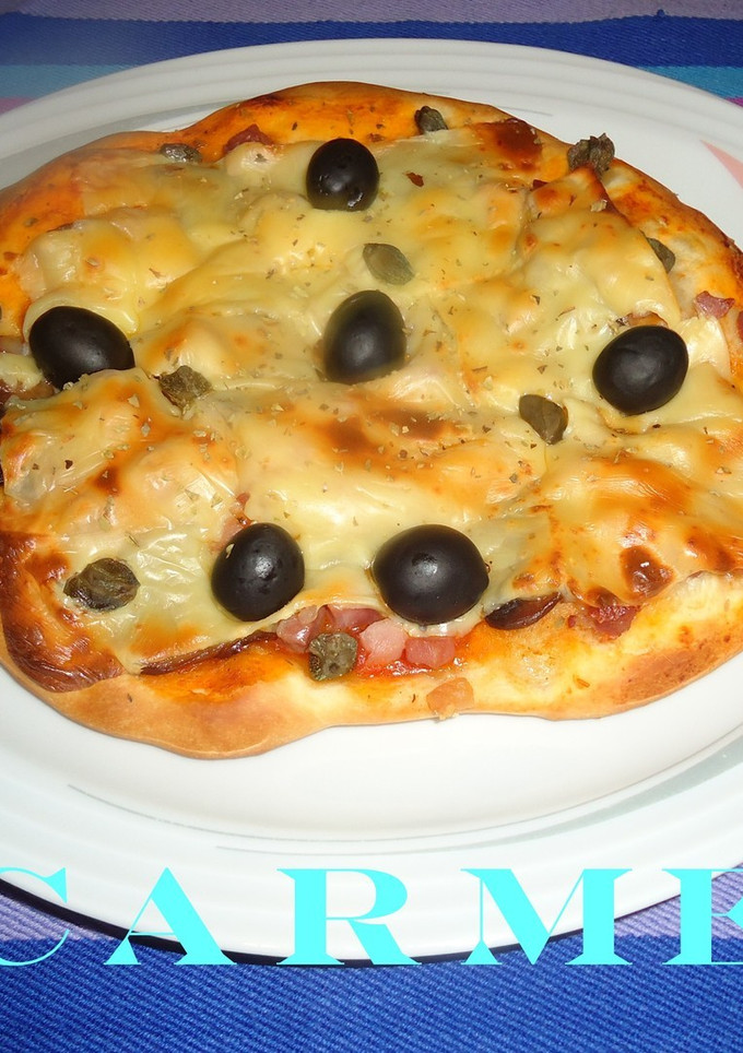 Una foto de Pizzeta de jamón serrano y champiñones
