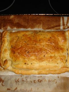 Una foto de Empanada de salmón y emmental