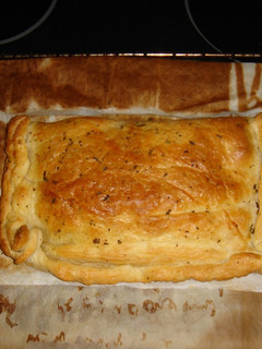 Una foto de Empanada de salmón y emmental