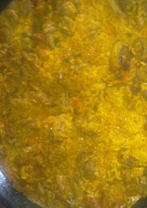 Una foto de Arroz con lagartito iberico y champiñones