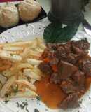 Estofado de buey con vino tinto y naranja