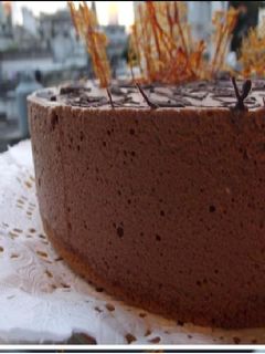 Una foto de Mousse de crema, chocolate y dulce de leche