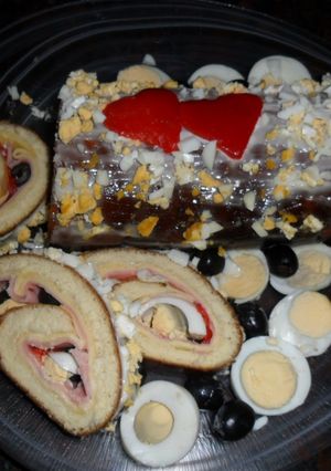 Una foto de Arrollado de pionono con jamón y queso