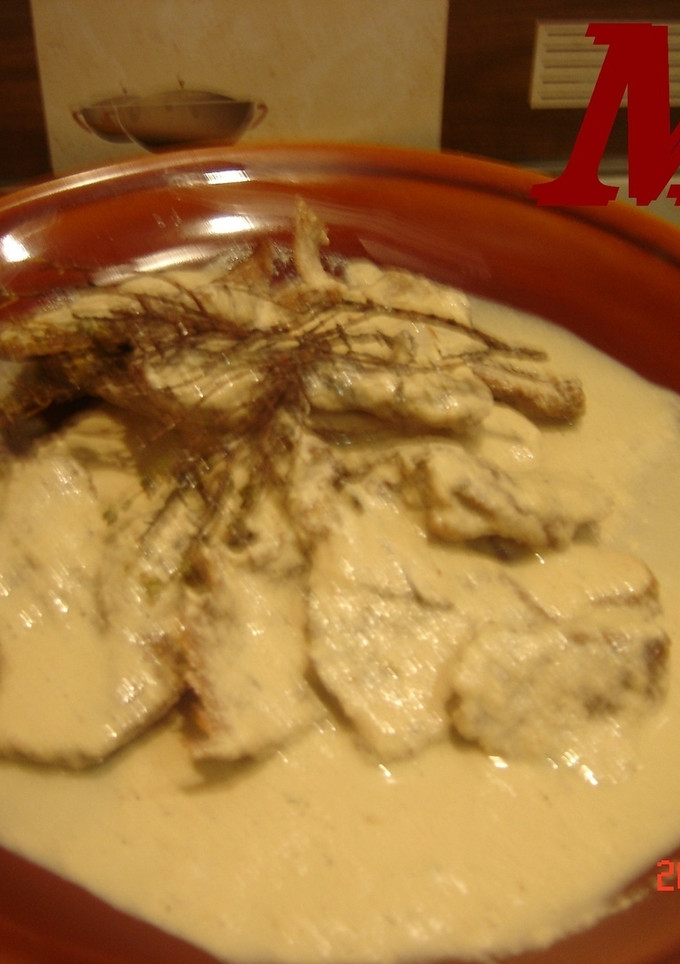 Una foto de Escalopines con salsa de infusión de tomillo