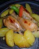 Muslitos de pollo y patatas a la naranja
