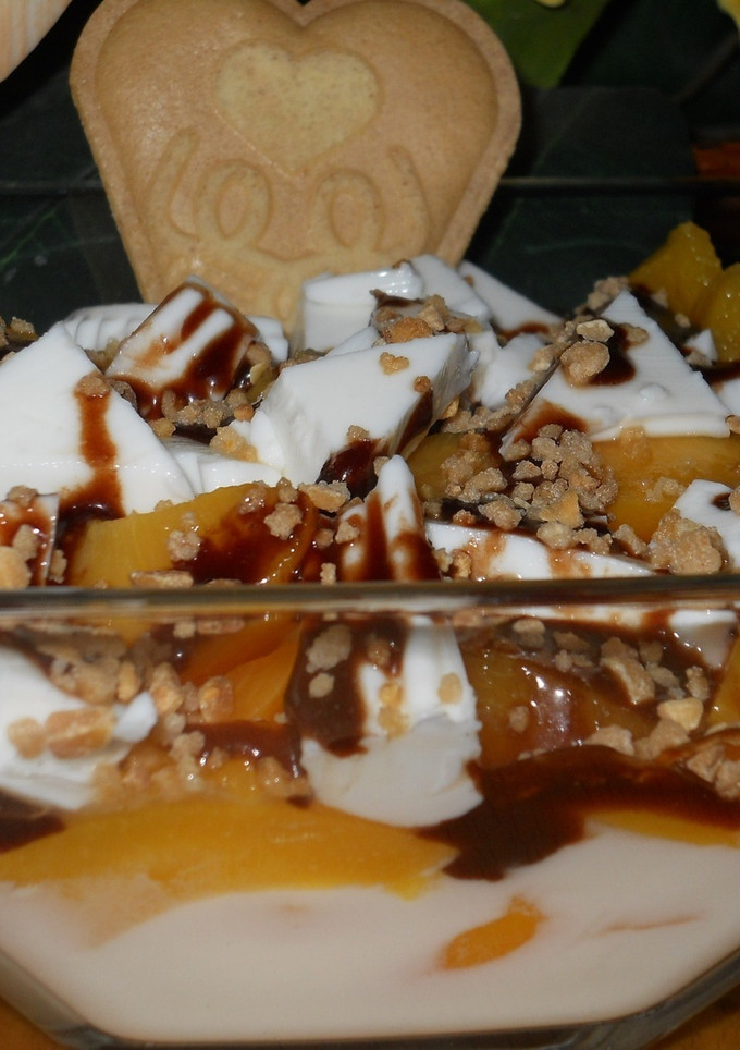 Una foto de Yogurt al queso con melocotón light