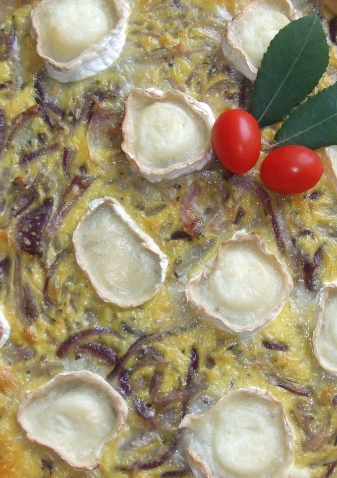 Una foto de Tarta tres cebollas