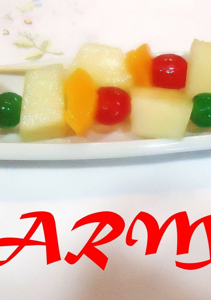 Una foto de Brochetas de melón y melocotón