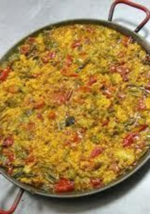 Una foto de Arroz seco de bacalao con verduras