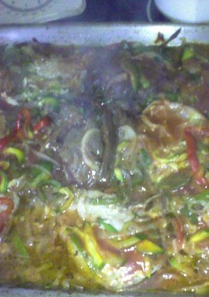 Una foto de Chuletitas de cerdo sobre colchón de verduras