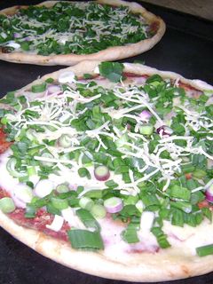 Una foto de Pizza de verdeo