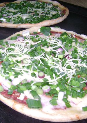 Una foto de Pizza de verdeo