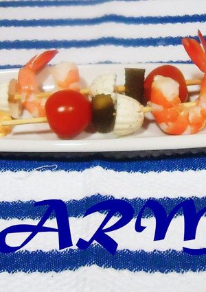 Una foto de Brochetas de burguitos y langostinos