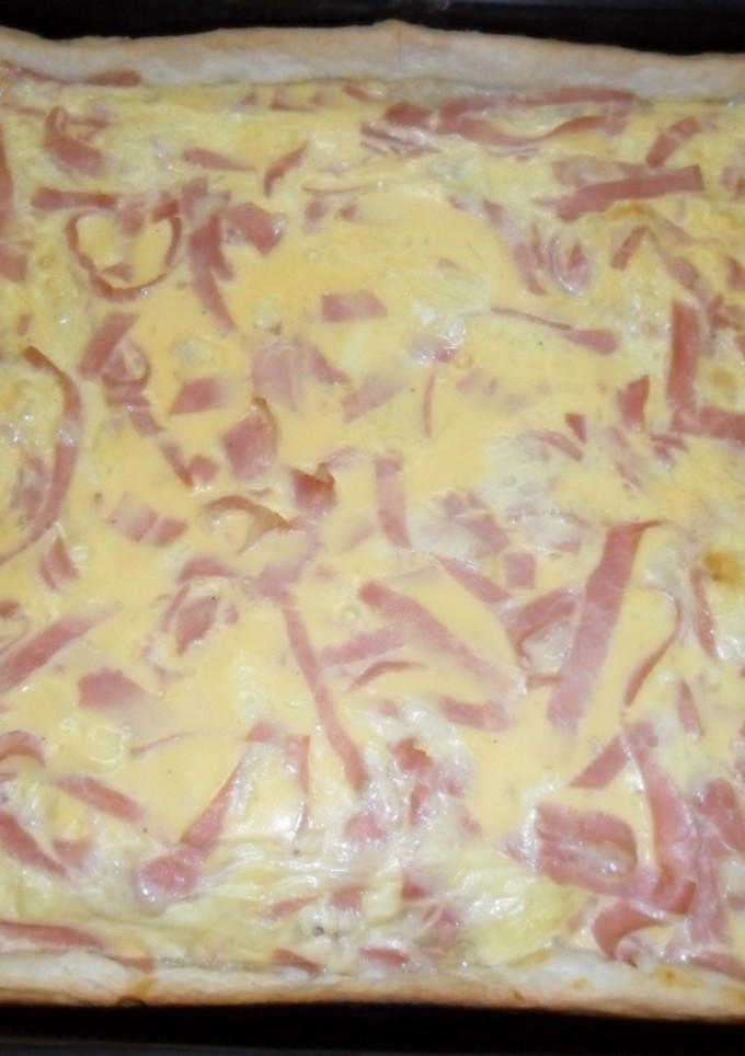 Una foto de Tarta abierta de york, queso y huevos
