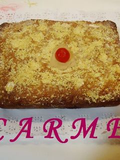 Una foto de Plum cake con chocolate, almendras y pasas