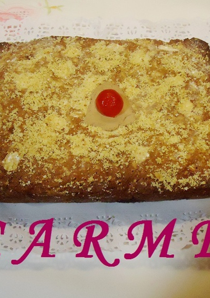 Una foto de Plum cake con chocolate, almendras y pasas