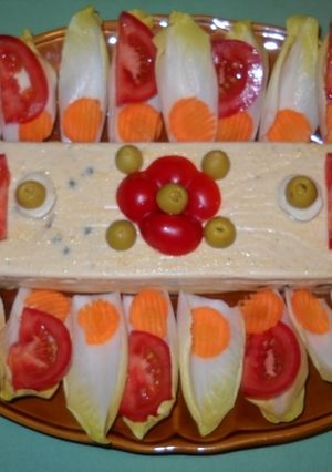 Una foto de Pastel de pescado con pimientos y guisantes