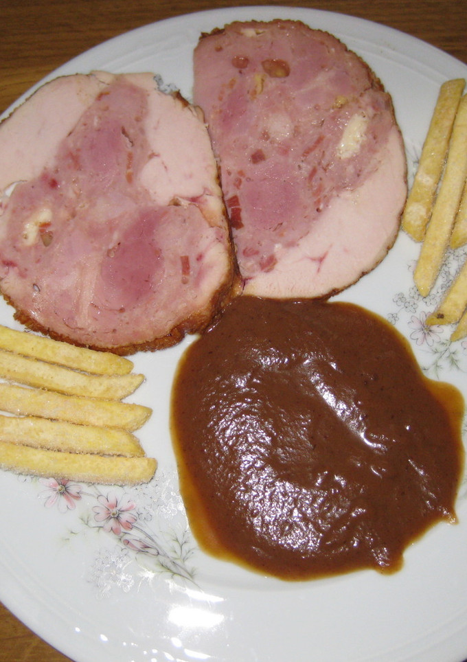Una foto de Roti de pollo con salsa de ciruelas