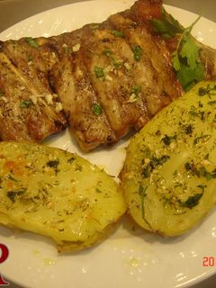 Una foto de Patatas al caliu