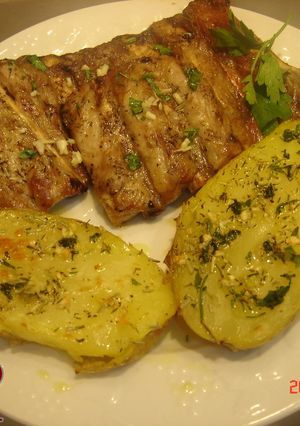 Una foto de Patatas al caliu