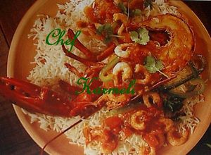 Una foto de Lubigante Relleno sobre Arroz Zuria y Gambas