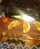 Bizcocho de café con salsa de naranja