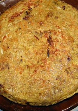 Una foto de Tortilla de vegetales rallados