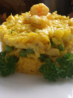 Una foto de Risotto de cabracho y gambitas