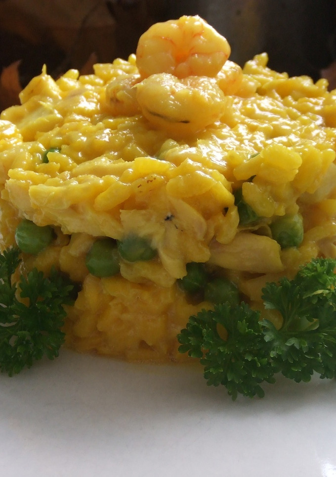 Una foto de Risotto de cabracho y gambitas