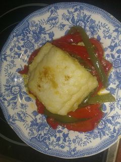 Una foto de Bacalao a la portuguesa con pimientos
