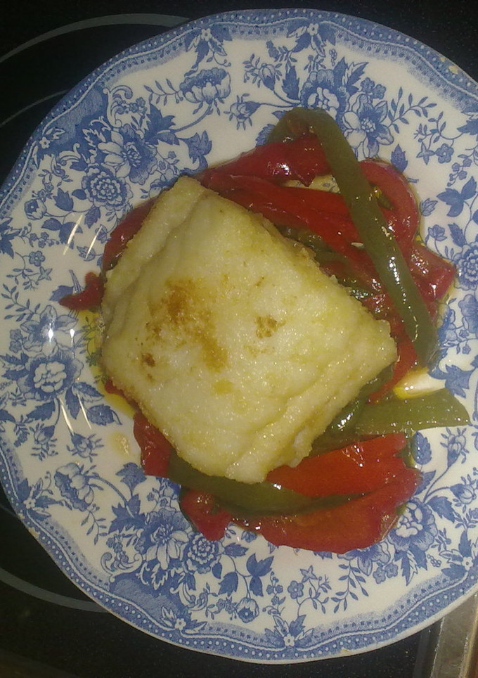 Una foto de Bacalao a la portuguesa con pimientos
