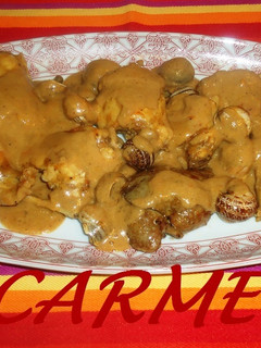 Una foto de Fritada de conejo y caracoles