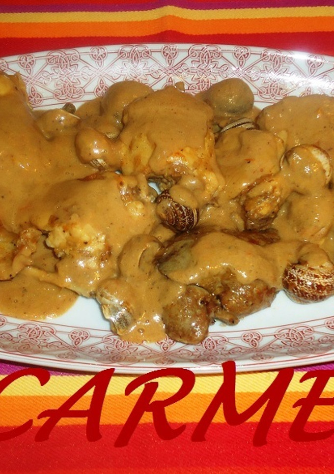 Una foto de Fritada de conejo y caracoles