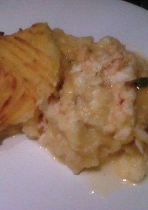 Una foto de Pastel de merluza y salmón