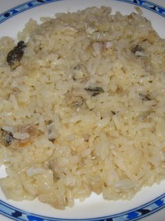 Una foto de Arroz blanco con bacalao