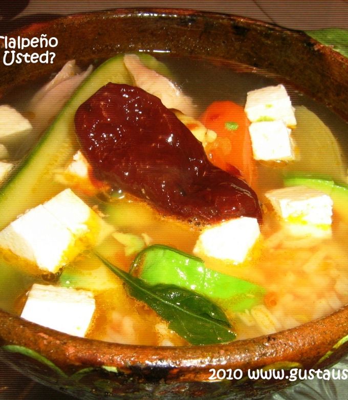 Una foto de Caldo Tlalpeño auténtico