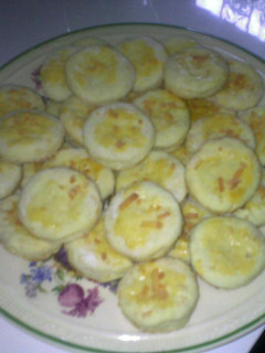 Una foto de Scones con queso rallado