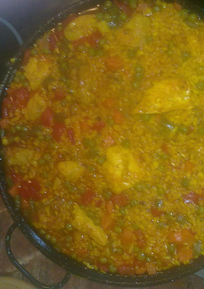 Una foto de Arroz con pollo granja