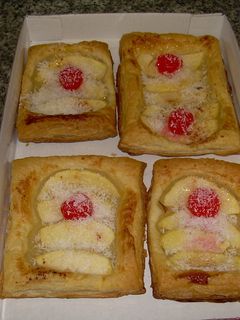 Una foto de Tarta de manzana bañada en coco rallado