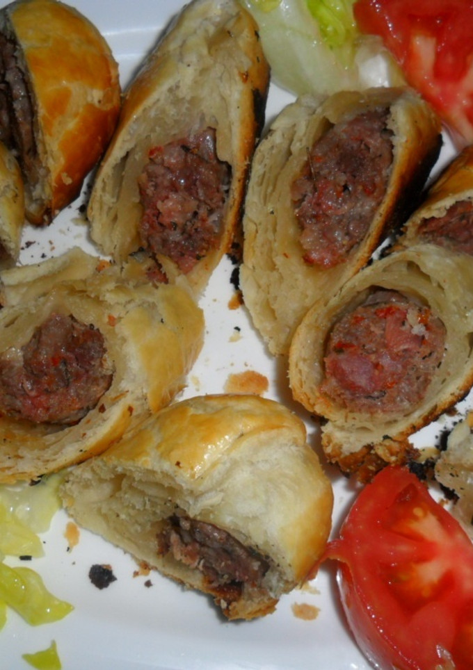 Una foto de Chorizos criollos envueltos en hojaldre