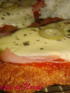 Una foto de Milanesas a la Napolitana