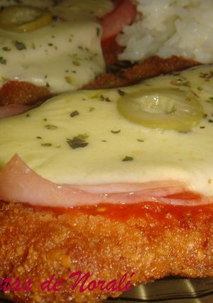 Una foto de Milanesas a la Napolitana