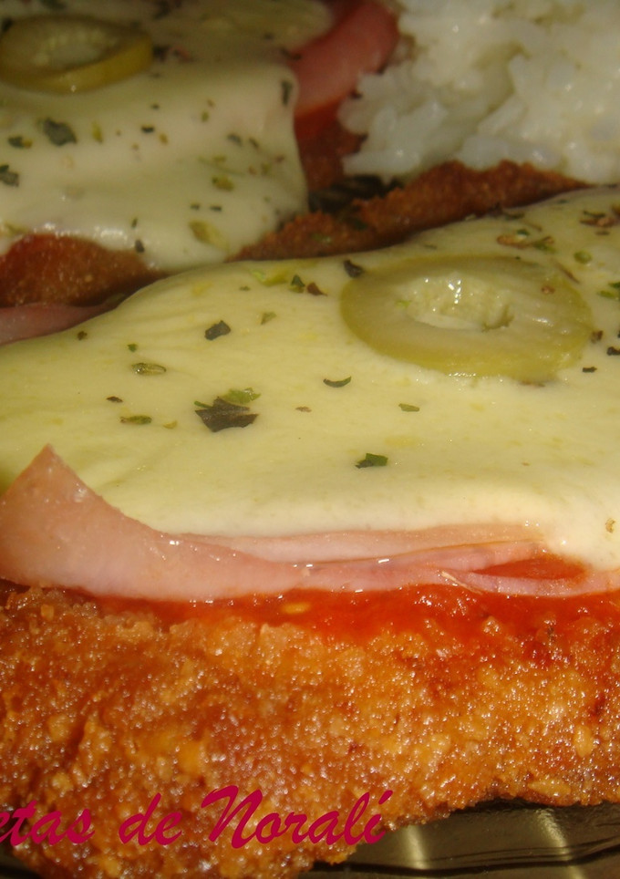 Una foto de Milanesas a la Napolitana